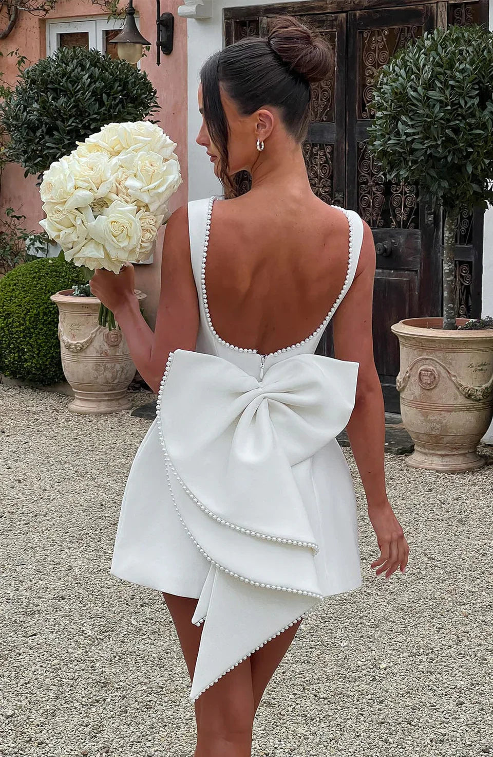 Backless Mini Dress with Oversized Bow Detail